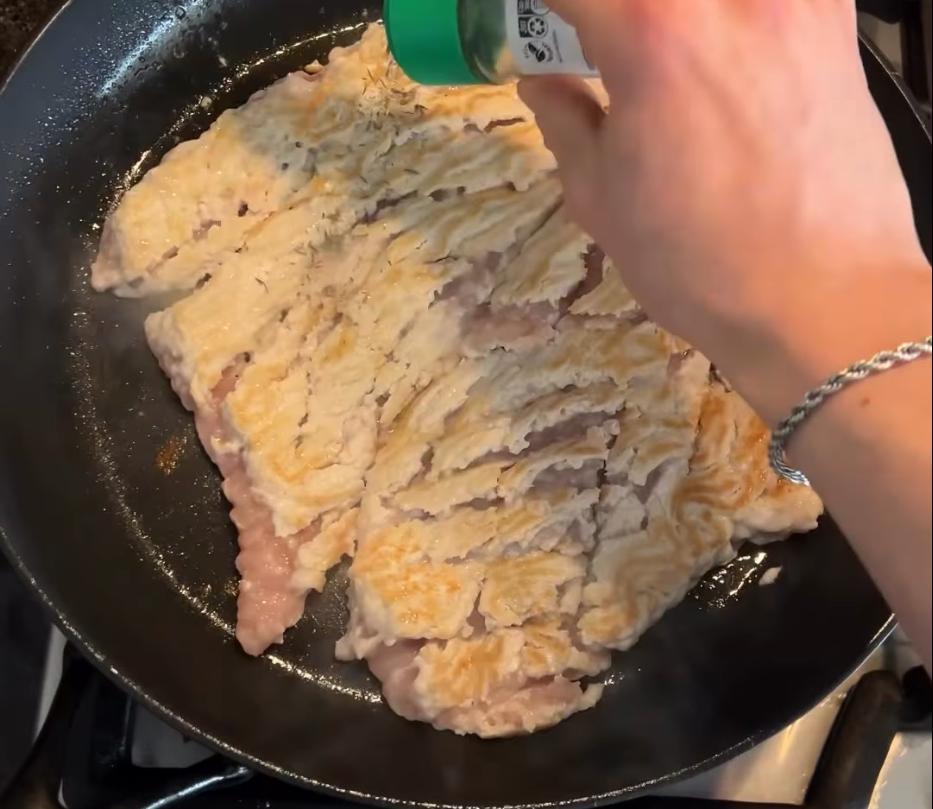 Step 1.1: Press the chicken breast mince flat into a hot pan
