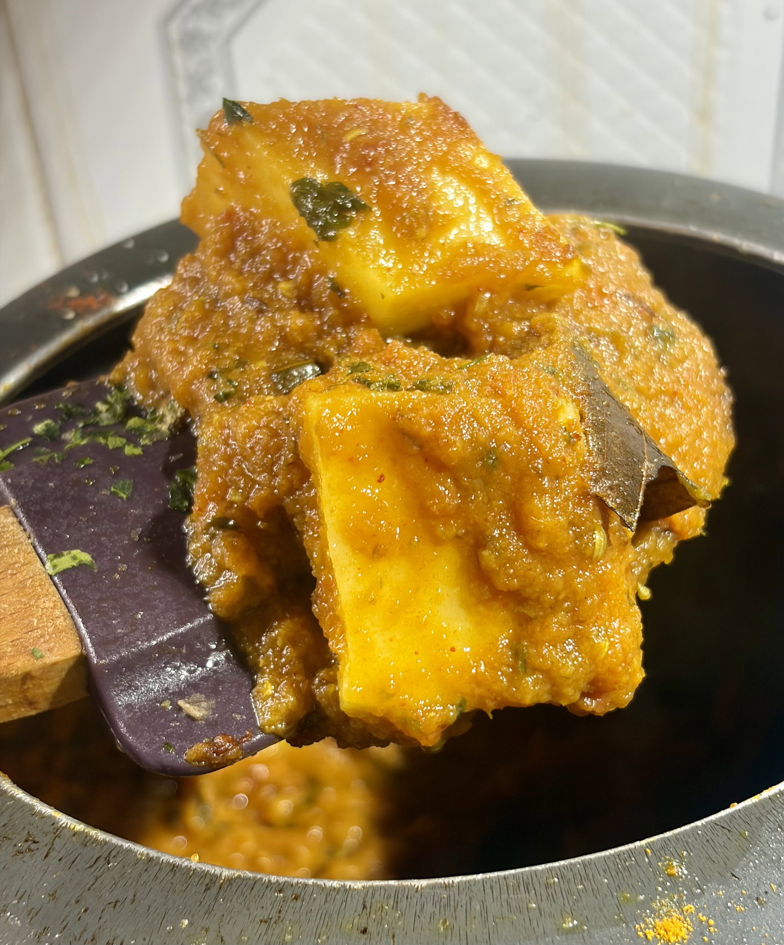 Step 2.1: Add the cubed potatoes and toss them in the masala for 3-4 minutes to coat them well