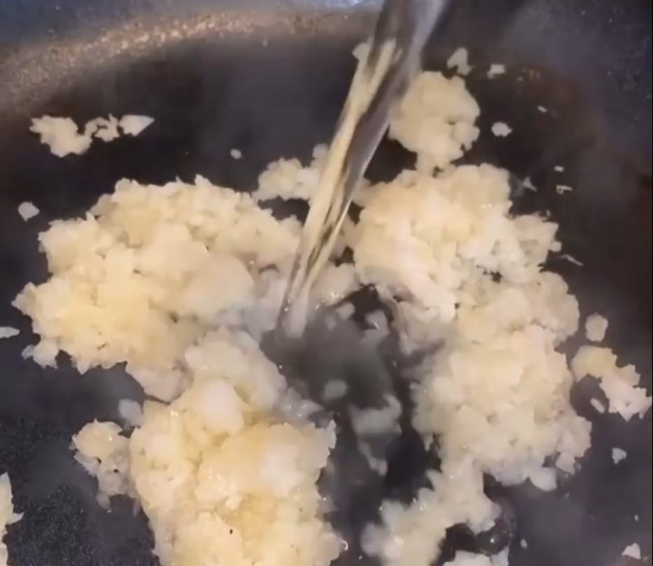 Step 1.1: Reduce the grated onion in the oil to remove the water, then add the tomato paste, turmeric, cayenne pepper, pepper, salt, and Libyan spices