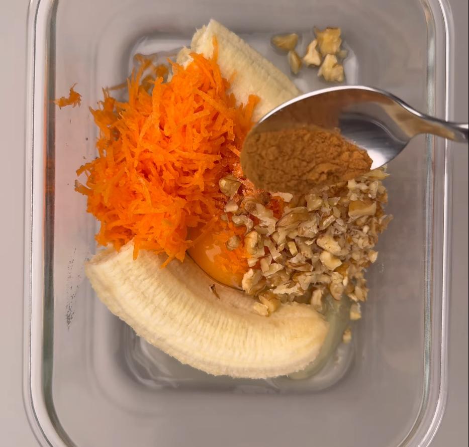 Step 2.1: Combine banana, egg, walnuts, carrots, rice flour, salt, baking soda, lemon juice, and cinnamon