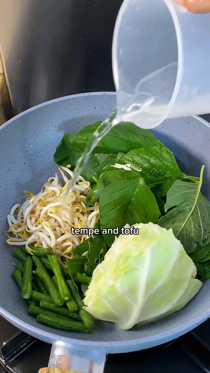 Step 1.1: Steam spinach, cabbage, bean sprouts, and long beans until tender but still vibrant in color