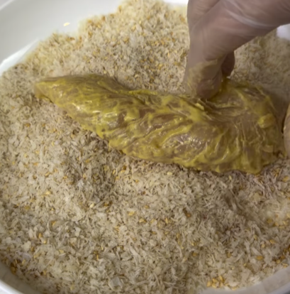 Step 3.1: Coat each chicken tender in the panko mixture, pressing gently so it sticks