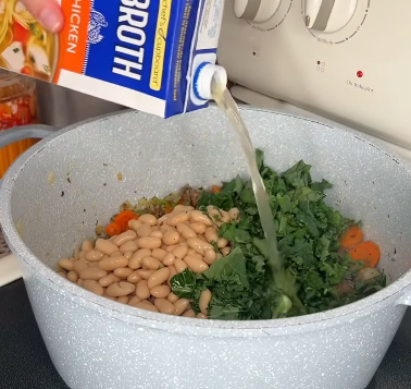 Step 1.1: Mix in cannellini beans, kale, and chicken broth