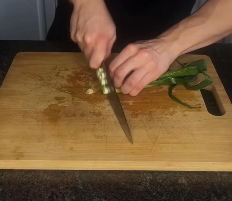 Step 1.1: Thoroughly wash the bok choy and separate the leaves from the stems