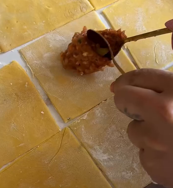 Step 3.1: Use a spoonful of the filling to stuff each wonton