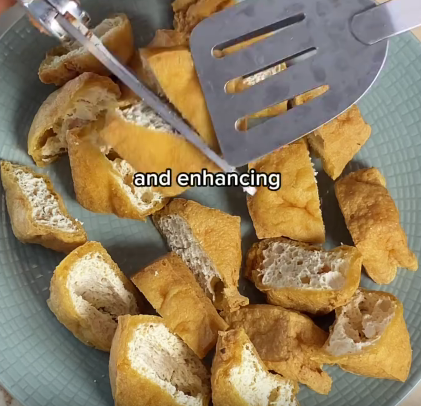 Step 4.1: Arrange the tofu on a serving plate or bowl, then pour the sauce over the tofu