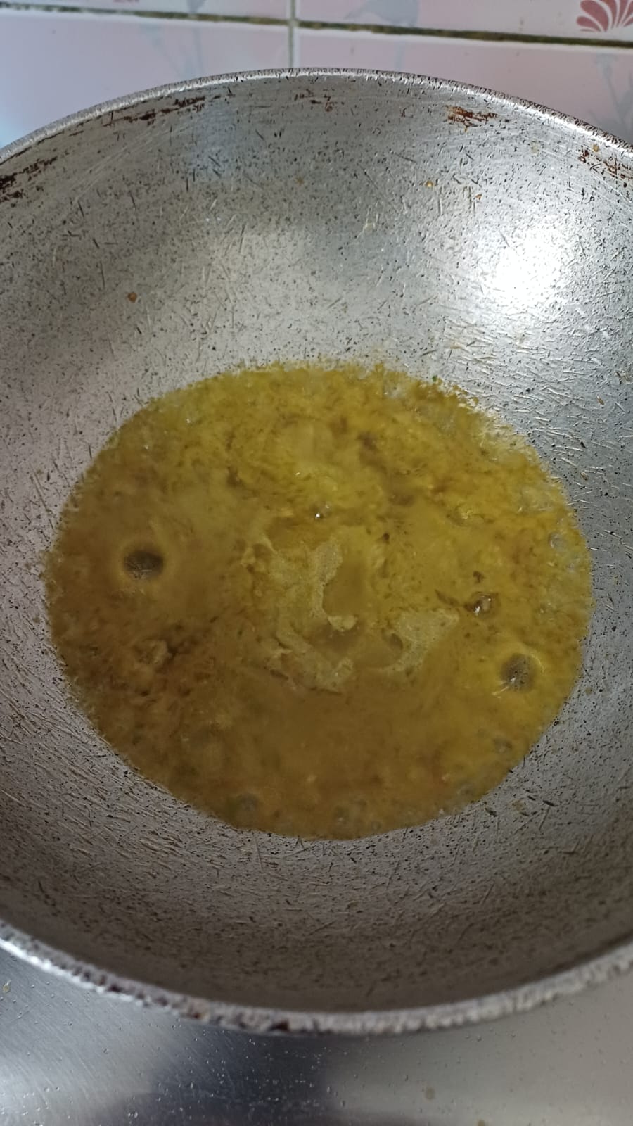 Step 2.1: Heat oil in a pan and add the prepared paste