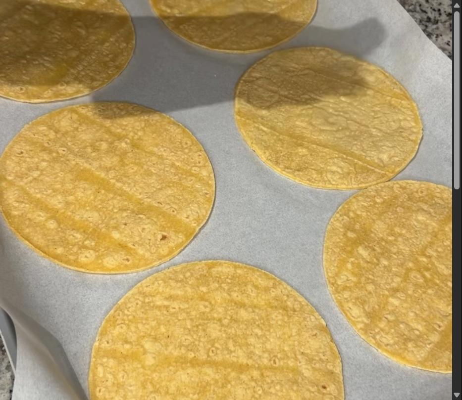 Step 1.1: Place corn tortillas on a parchment-lined baking sheet and spray one side with cooking spray