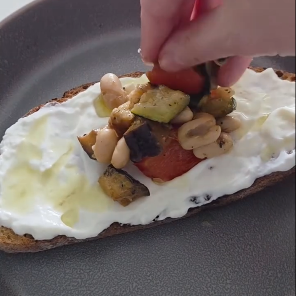 Step 3.1: Top the toast with the roasted vegetable and Cannelloni bean mixture