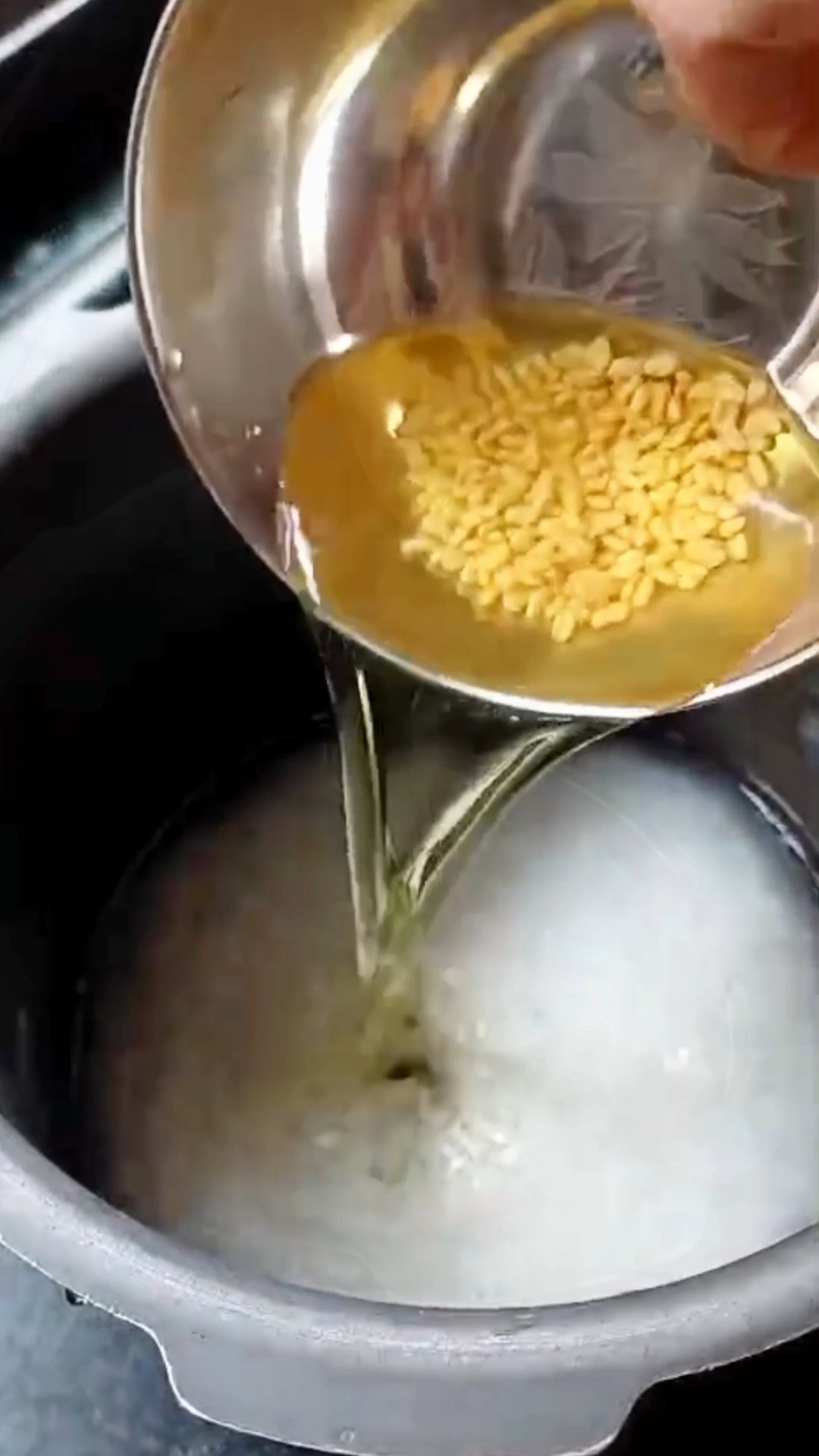 Step 1.1: Drain and transfer both to a pressure cooker
