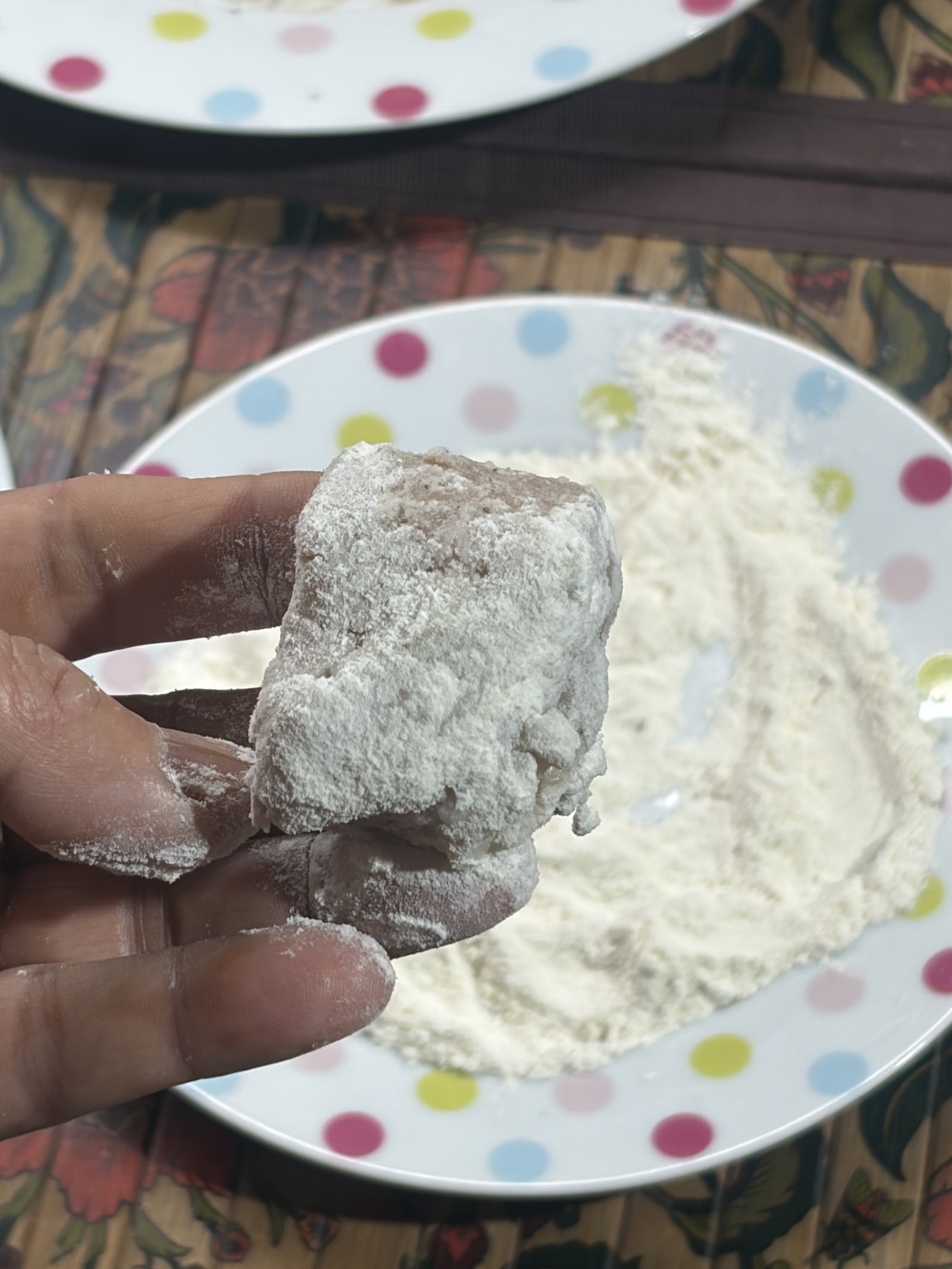 Step 2.1: Mix black pepper and salt with all-purpose flour and lightly coat the marinated fish