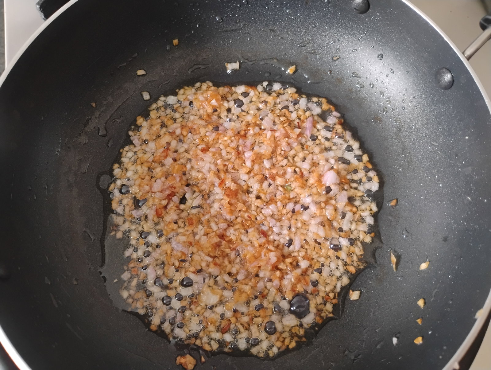 Step 1.1: Heat oil in a pan on low flame