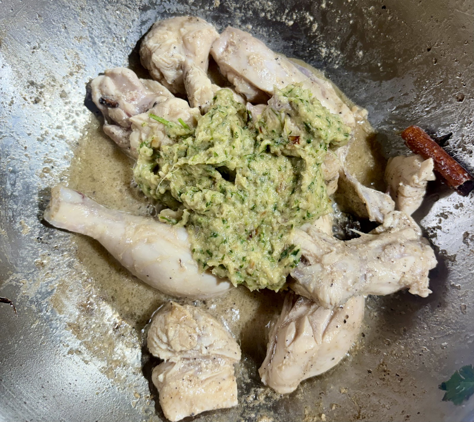 Step 3.1: Add the prepared onion-coriander paste and stir well to coat the chicken pieces