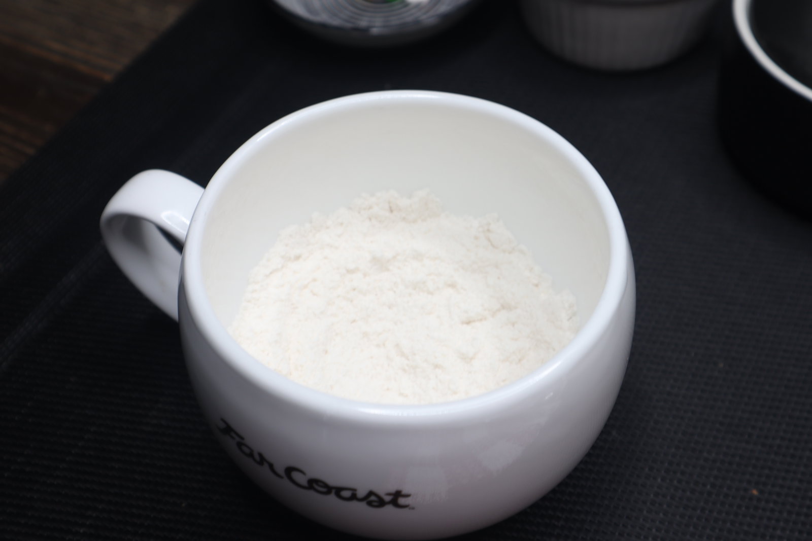 Step 1.1: Mix all-purpose flour, cocoa powder, sugar, baking powder, and salt in a mug