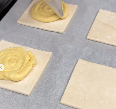 Step 2.1: Spread the almond filling evenly, leaving a 2cm border around the edges