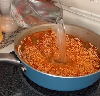 Step 2.1: Pour in water and bring to a boil