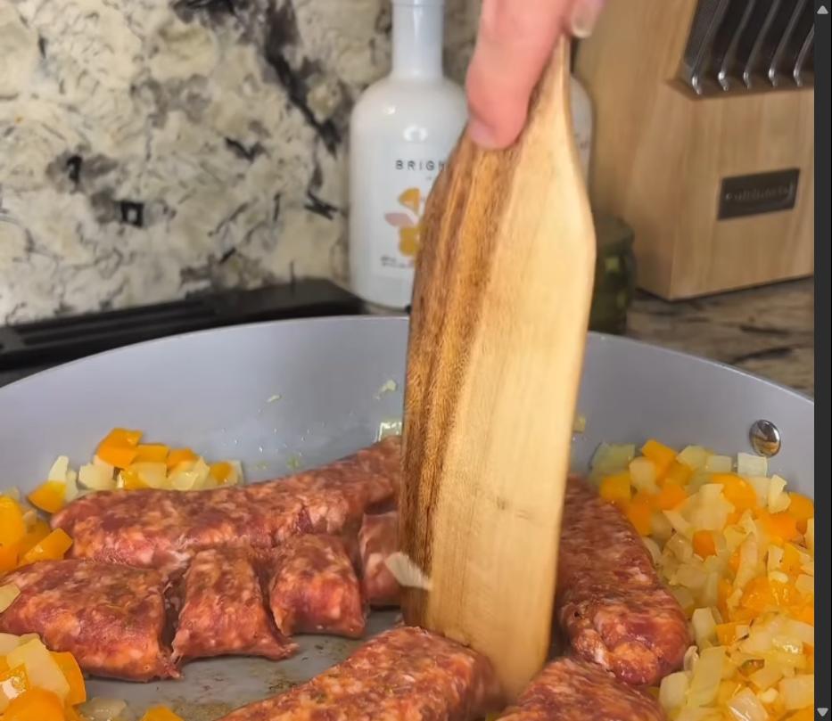 Step 2.1: Add the Italian sausage and cook, breaking it up with a spoon, until browned and cooked through, about 5–7 minutes