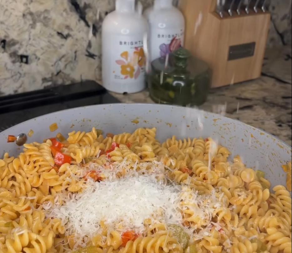 Step 2.1: Add grated parmesan and stir until melted and incorporated into the sauce