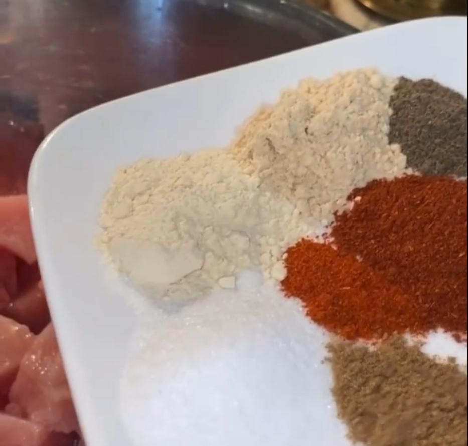Step 1.1: Season the chicken with garlic powder, ginger powder, salt, pepper, cayenne pepper, turmeric, clove powder, and chicken seasoning