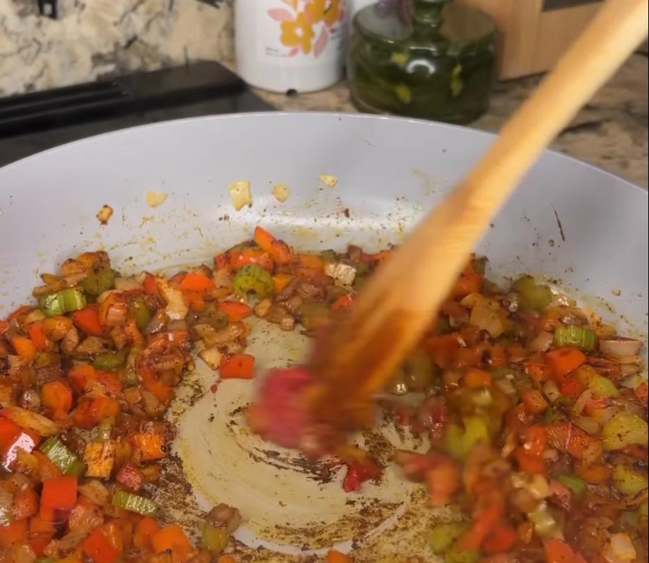 Step 2.1: Add tomato paste and stir well to combine