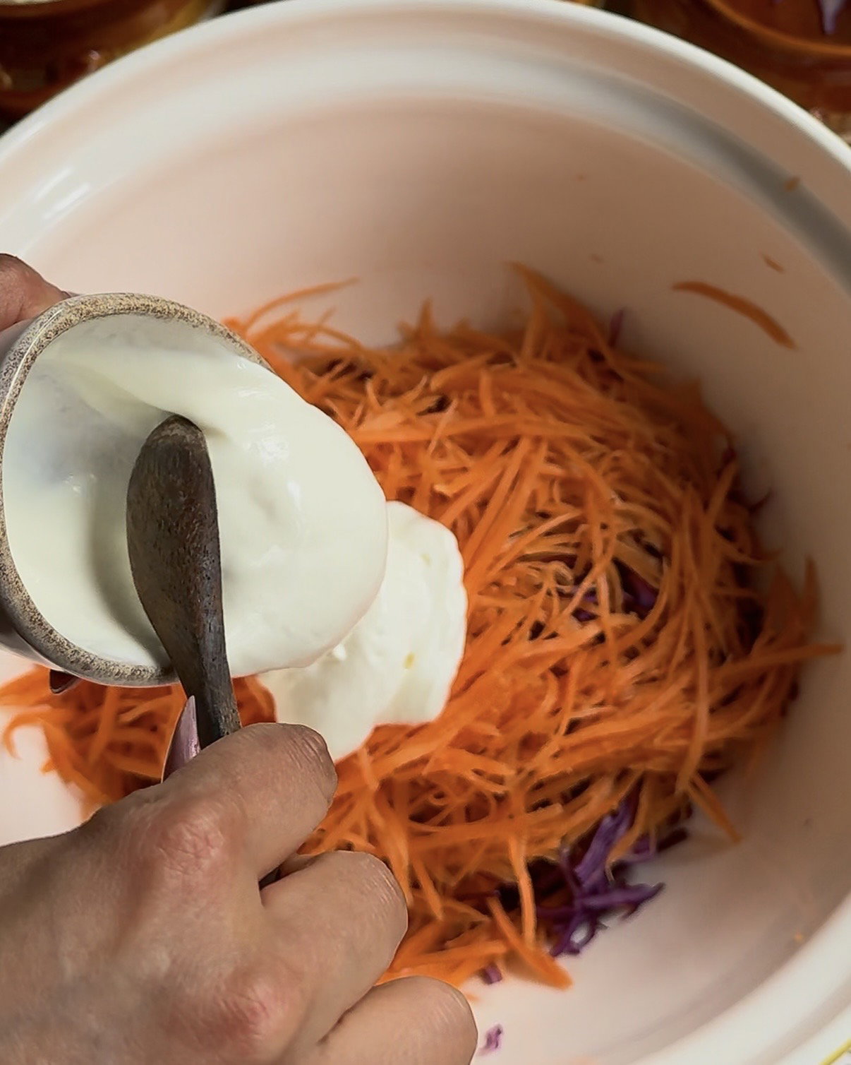 Step 2.3: Mix purple cabbage, carrots, sour cream, garlic granules, chives, and salt in a bowl until combined