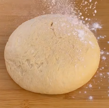 Step 1.1: Knead the dough until smooth and elastic, then cover and let it rise until doubled in size