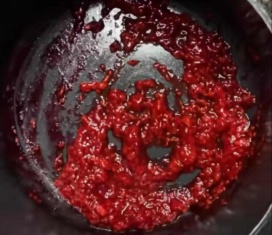 Step 1.1: Heat a saucepan on low heat, add the frozen raspberries and stevia, stirring and crushing raspberries with a spoon to form a jam