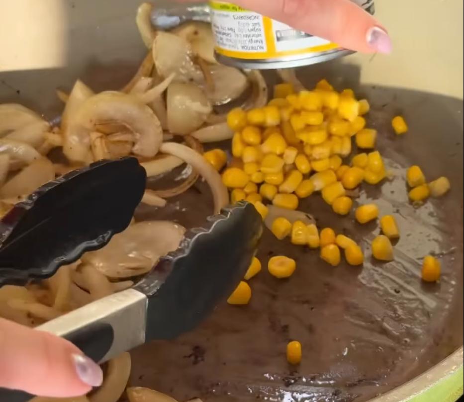 Step 1.1: In the same pan over medium heat, fry the onions for a few minutes, then add the sweetcorn, rice and sliced beef