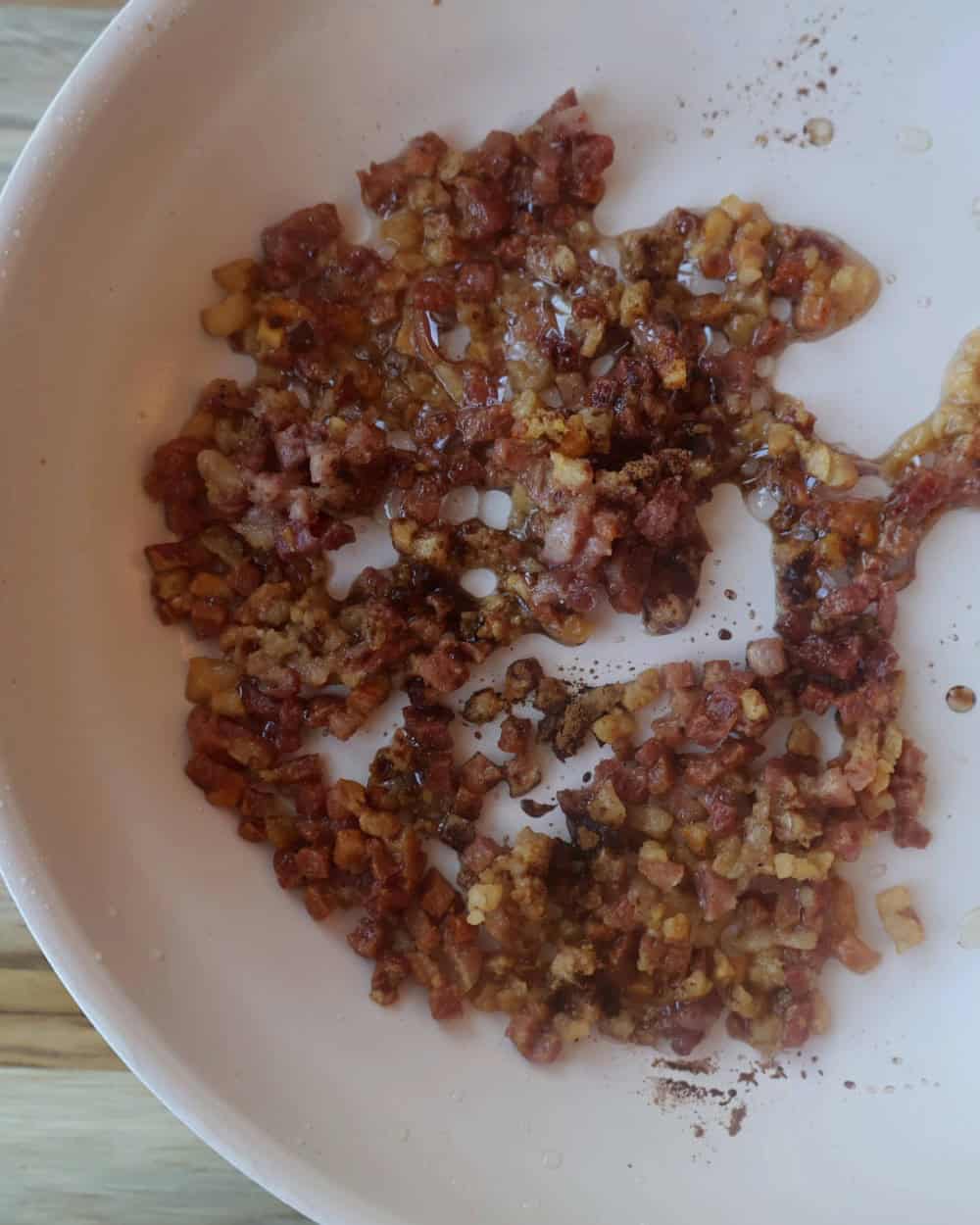 Step 1.1: Crisp the pancetta: In a skillet over medium heat, cook diced pancetta until the fat is rendered, 6-8 minutes