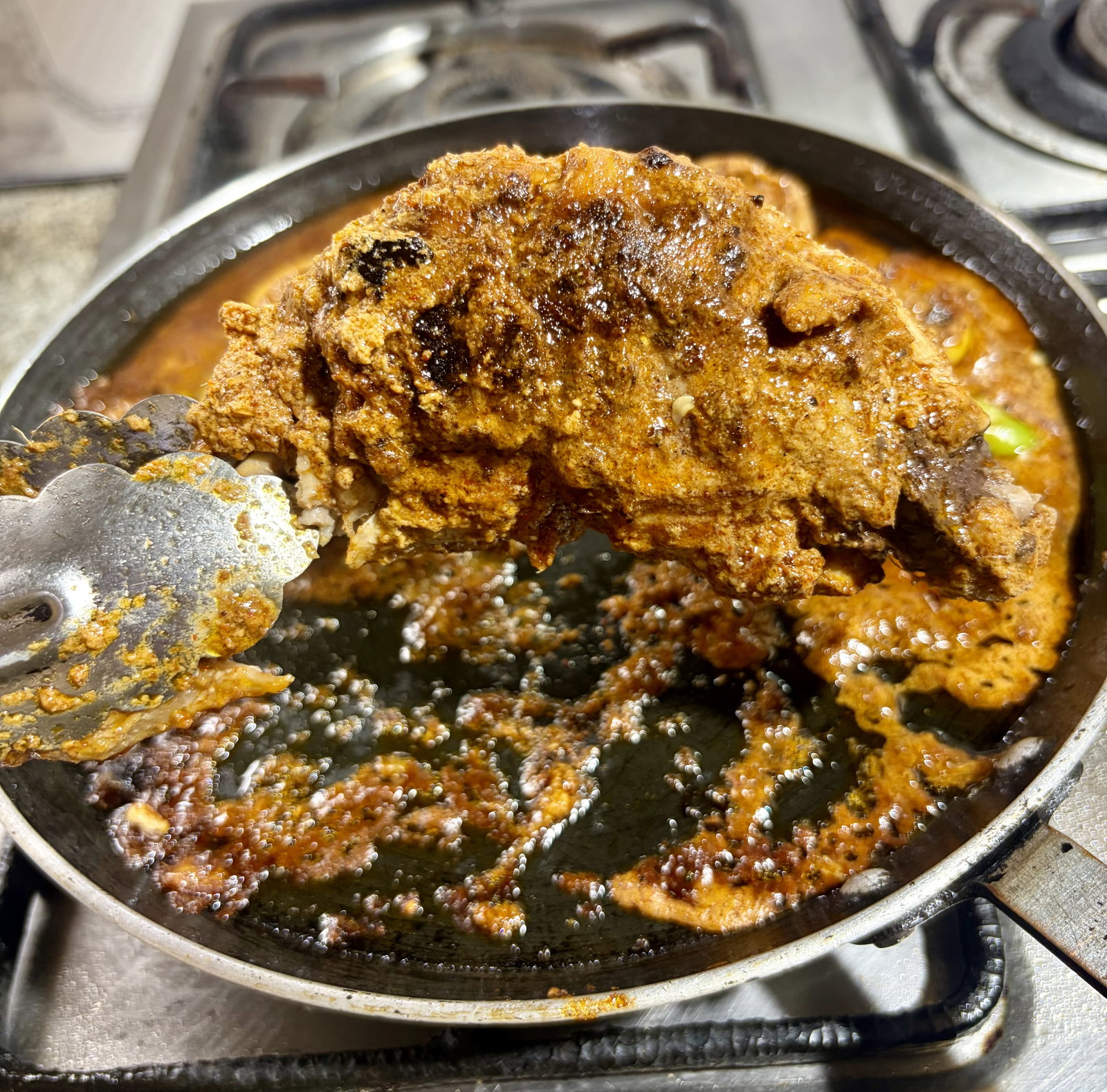 Step 3.1: Cover the tawa with a dome lid or a large deep plate and cook for 15β20 minutes, turning the chicken occasionally so it cooks evenly