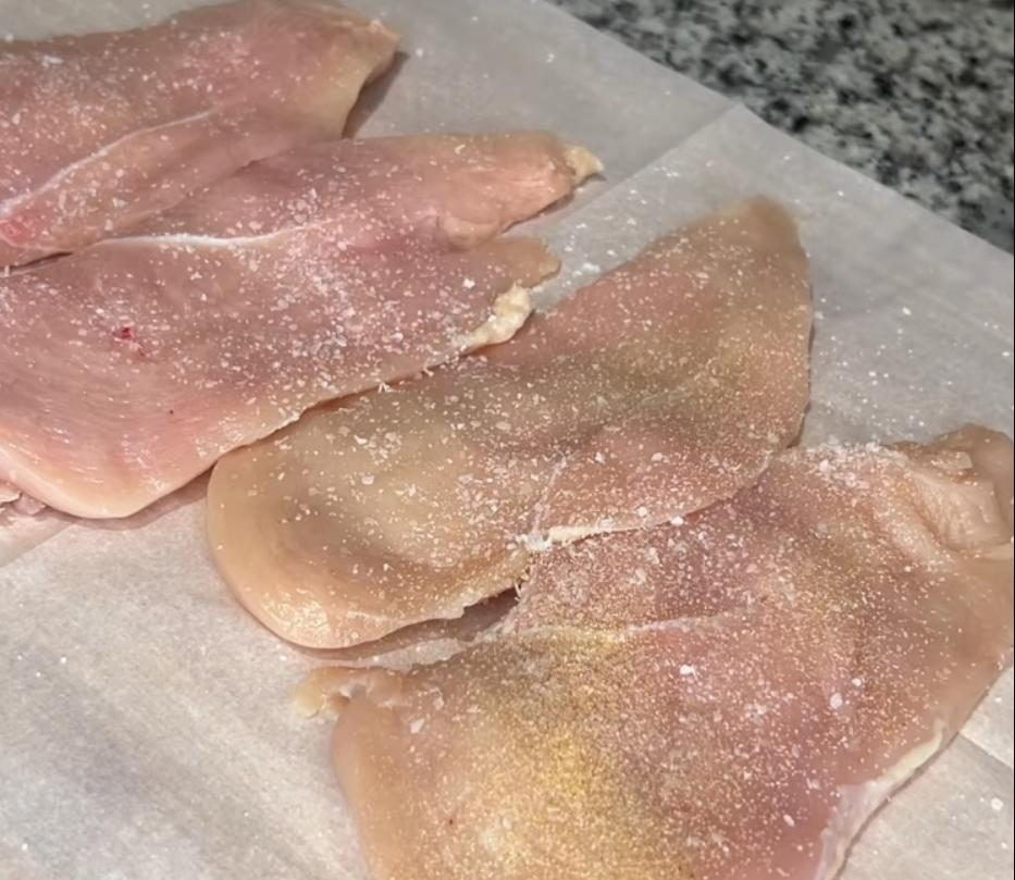 Step 2.1: Season both sides of the chicken breasts with salt, pepper, garlic powder, and thyme