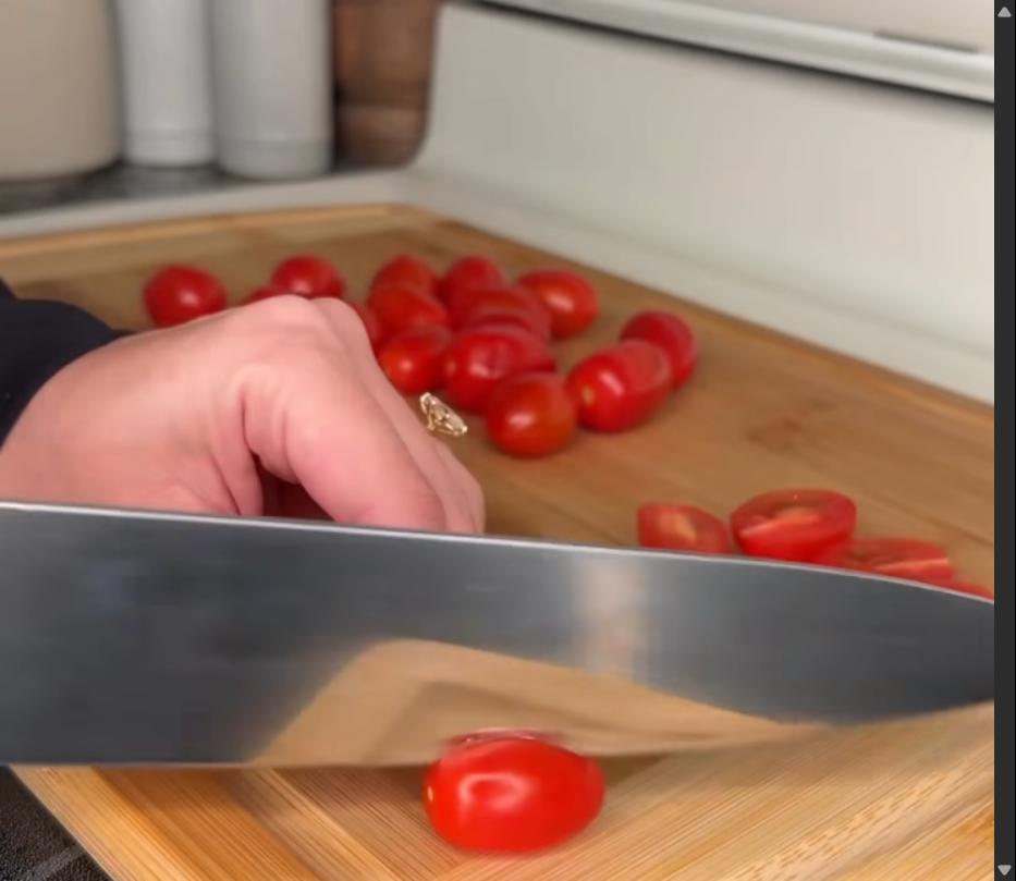 Step 1.1: Slice grape tomatoes in half, drizzle with olive oil, and sprinkle with salt