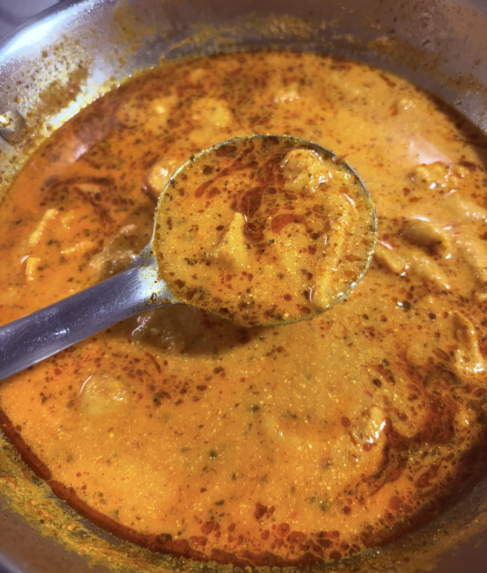 Step 5.2: Once floating, stir gently, cover with a lid, and simmer on low-medium heat for 10-15 minutes until the dumplings are cooked through and the gravy thickens to your liking