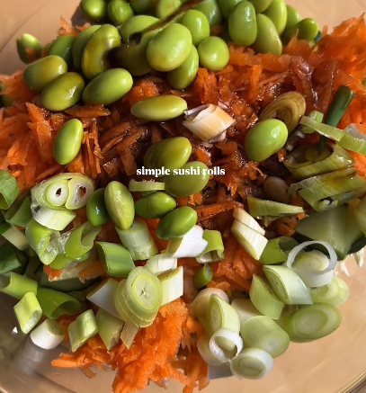 Step 1.1: Mix the grated tofu, cucumber, carrot, edamame beans, spring onion, rice vinegar, soy sauce, sesame oil, light mayo, and sriracha in a bowl