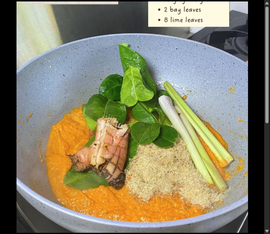 Step 3.1: Saute the spice paste with the aromatics (lemongrass, galangal, bay leaves, lime leaves) until fragrant