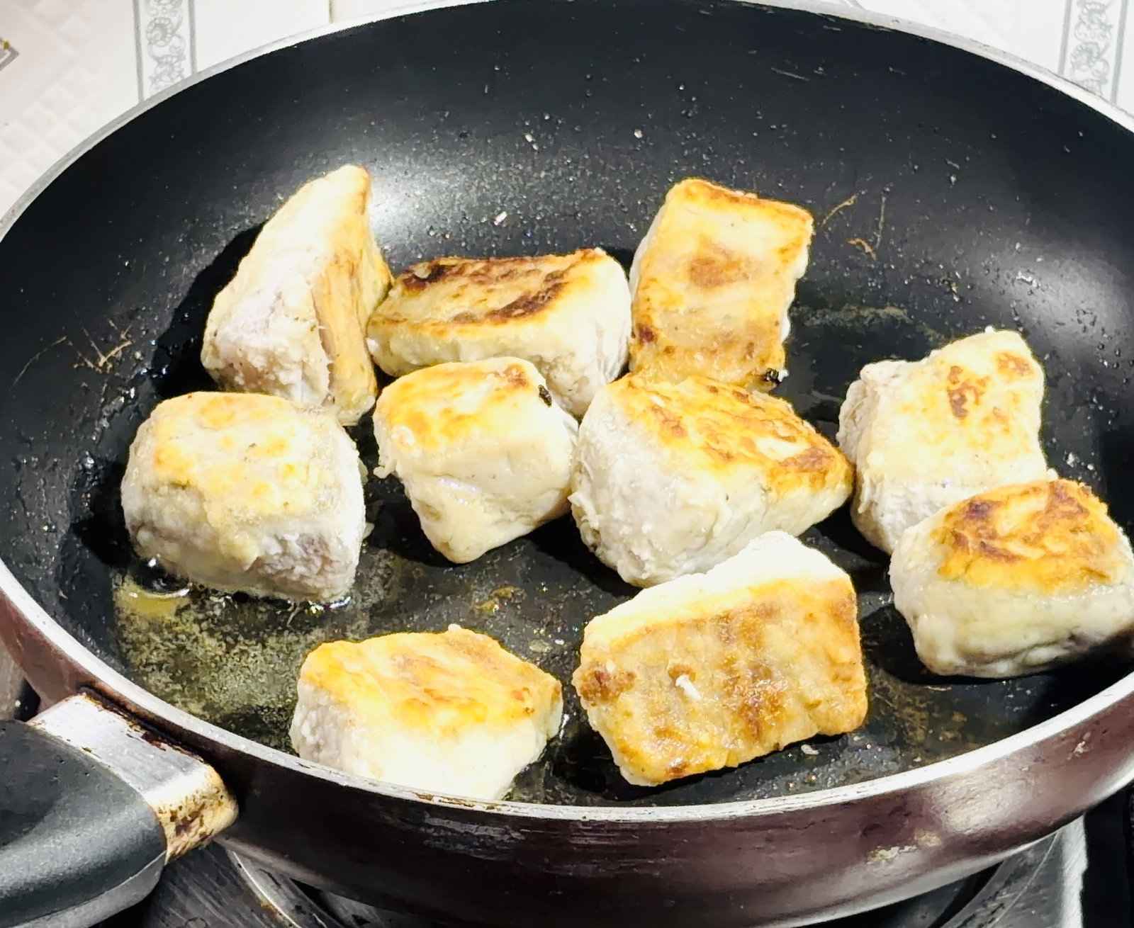 Step 2.2: Place the fish gently in the pan