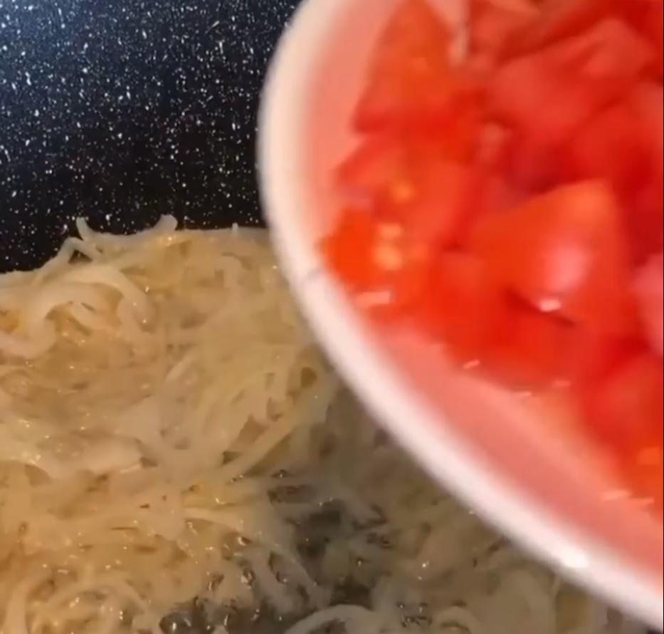 Step 1.1: Add the marinated lamb to a pot with the sliced onions, tomatoes, garlic paste, ginger paste, green chillies, and salt, then fill the pot with boiling water