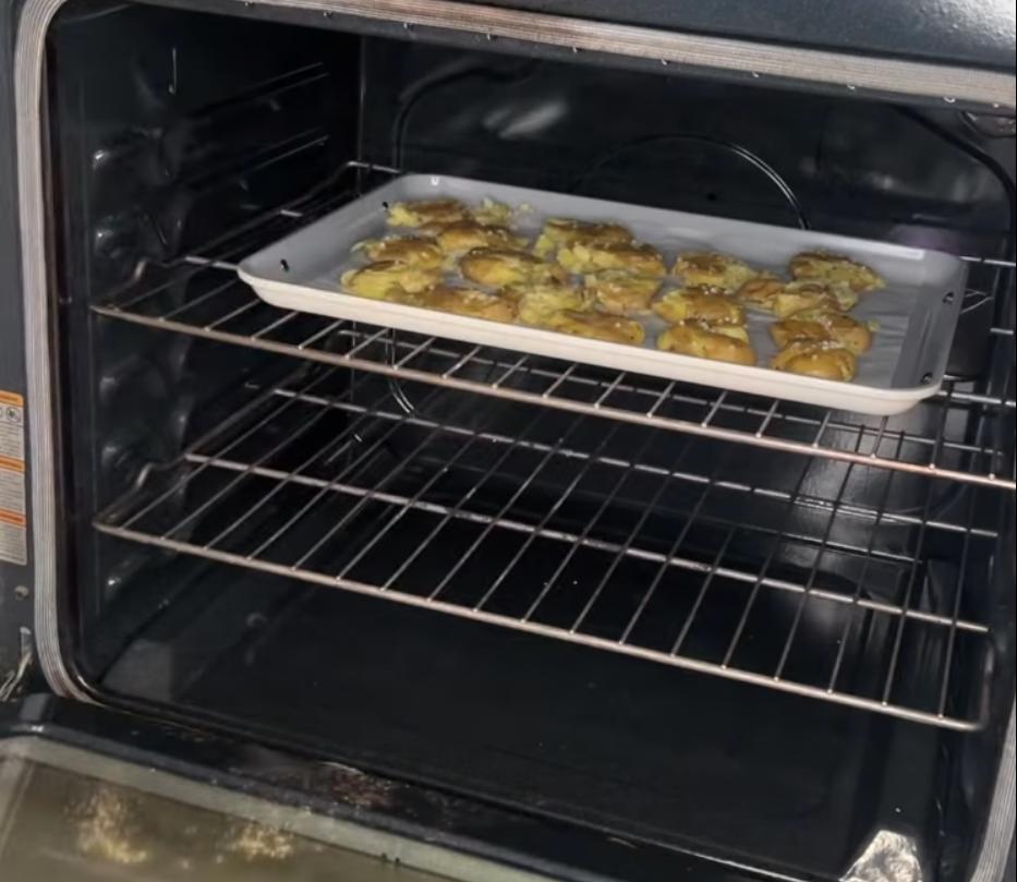 Step 1.1: Baste the smashed potatoes with the garlic butter mixture and bake for 20–25 minutes until crispy and golden