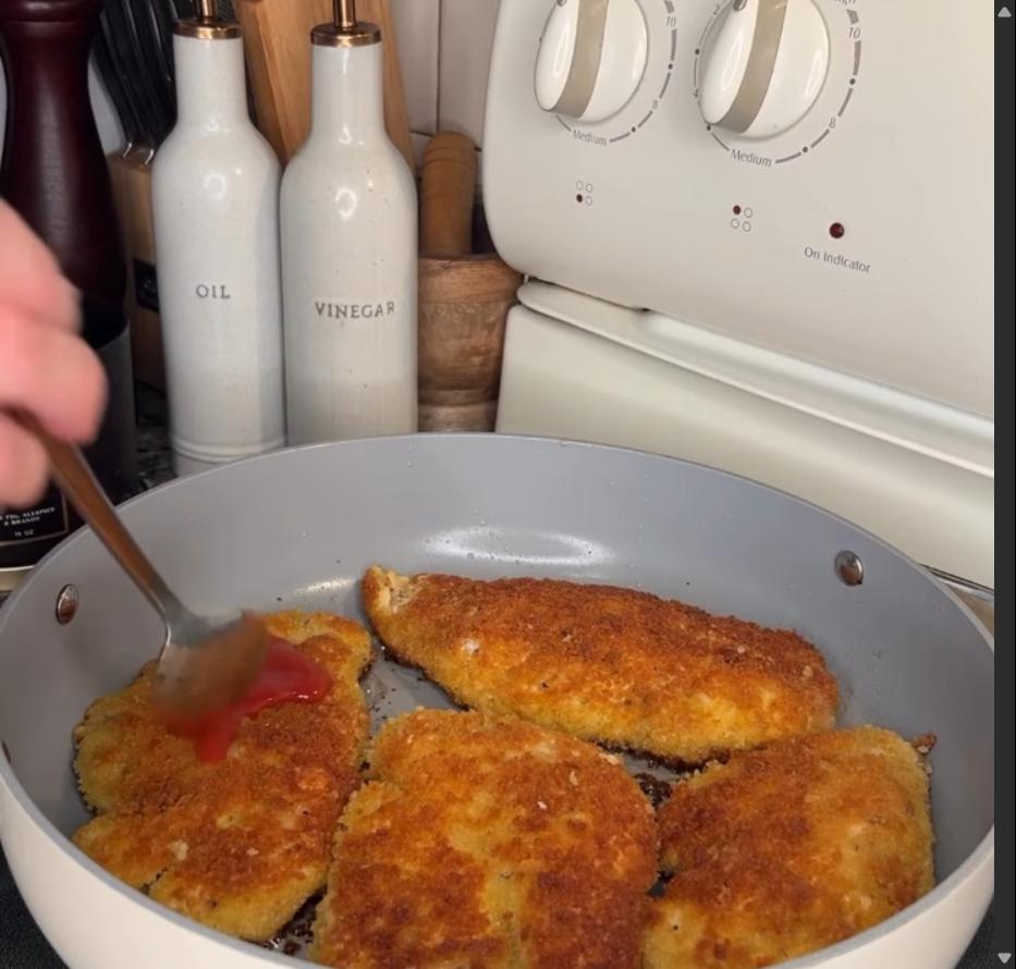 Step 2.1: Heat olive oil in a large sauté pan and shallow fry both sides of chicken until golden brown and crispy and until internal temperature reaches 165°F