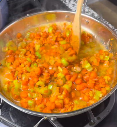 Step 2.1: Add white wine and scrape up any browned bits from the bottom of the pot
