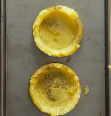 Step 1.1: Using a glass as a mould, gently smash the potato into a compact nest shape, creating a flat crispy base with slightly raised edges