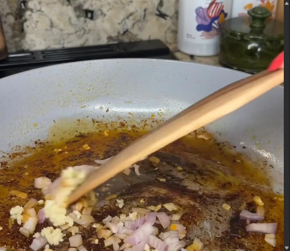 Step 2.1: Add diced shallot and minced garlic to the pan and sauté until fragrant
