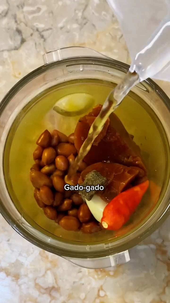 Step 3.1: Blend roasted peanuts, garlic, chili, palm sugar, shrimp paste, and a bit of water until smooth