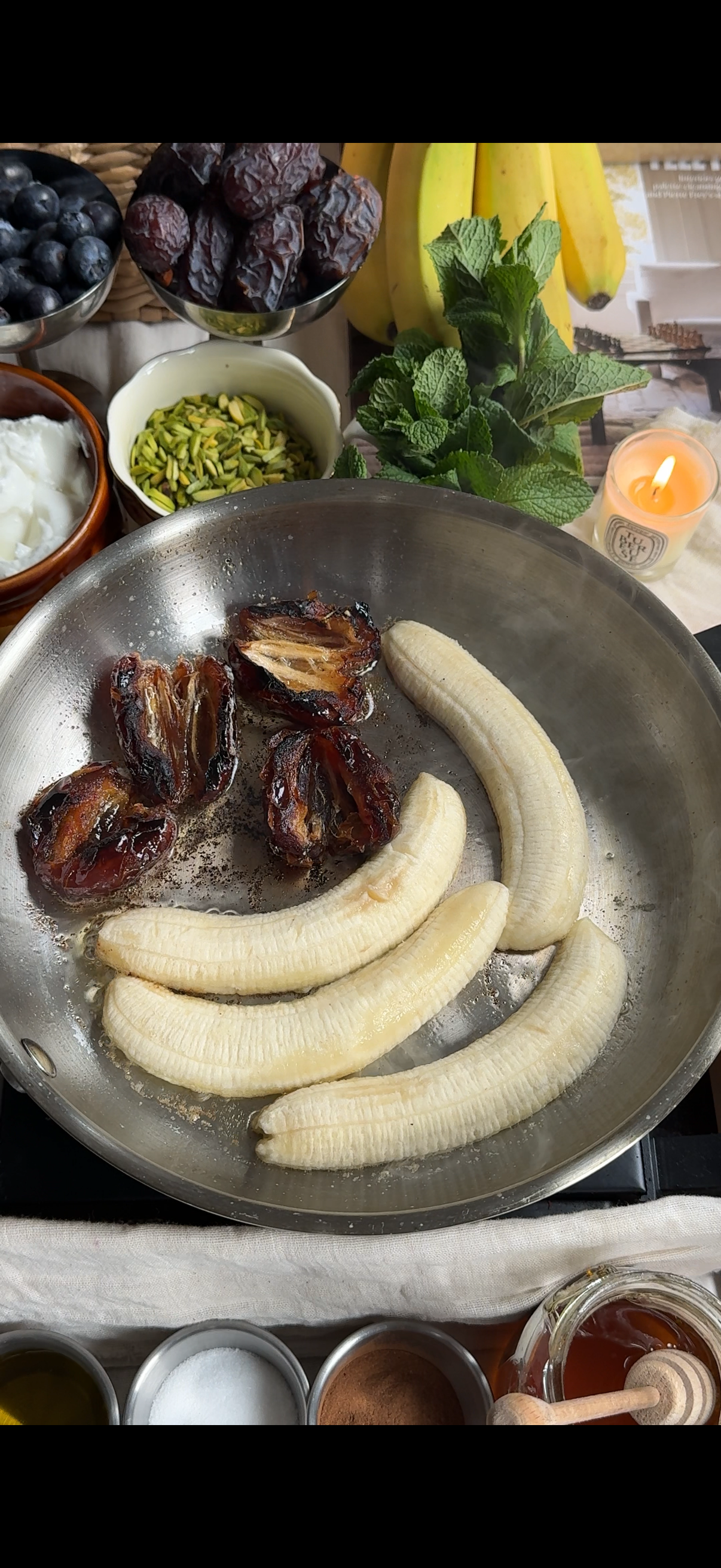 Step 1.3: Add sliced ripe bananas and Medjool dates to the pan