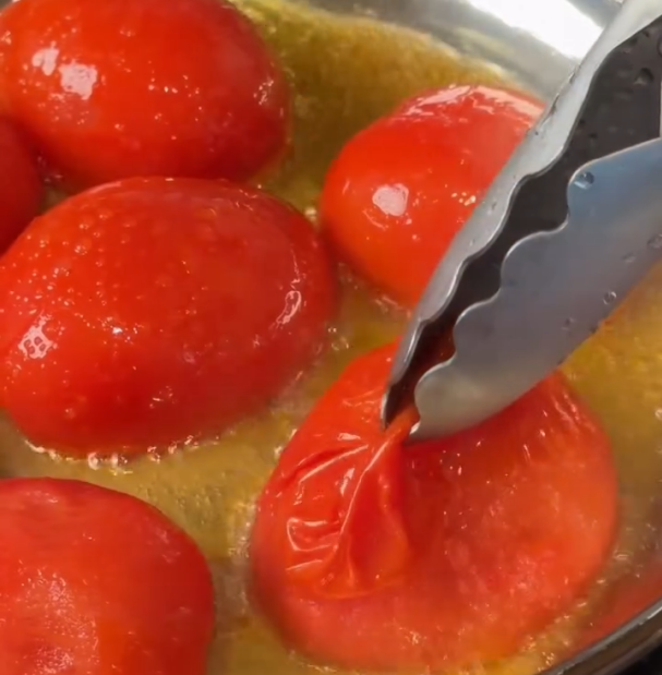Step 1.1: Remove the skins, then mash the tomatoes directly in the pan to create your sauce