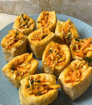 Step 2.1: Fill the tofu pockets with the sautéed vegetable mixture