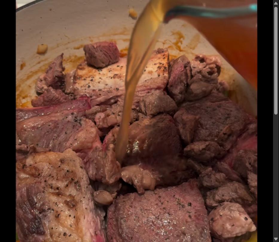 Step 1.1: Pour beef broth and 1/4 cup water into the pot