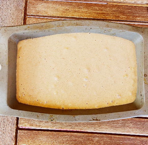 Step 1.1: Pour the batter into a baking tray and smooth the top