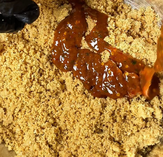Step 3.1: Mix the blended peanuts with the spice paste in a bowl until well combined