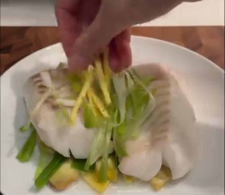 Step 1.1: Top the fish with julienned ginger and green onions